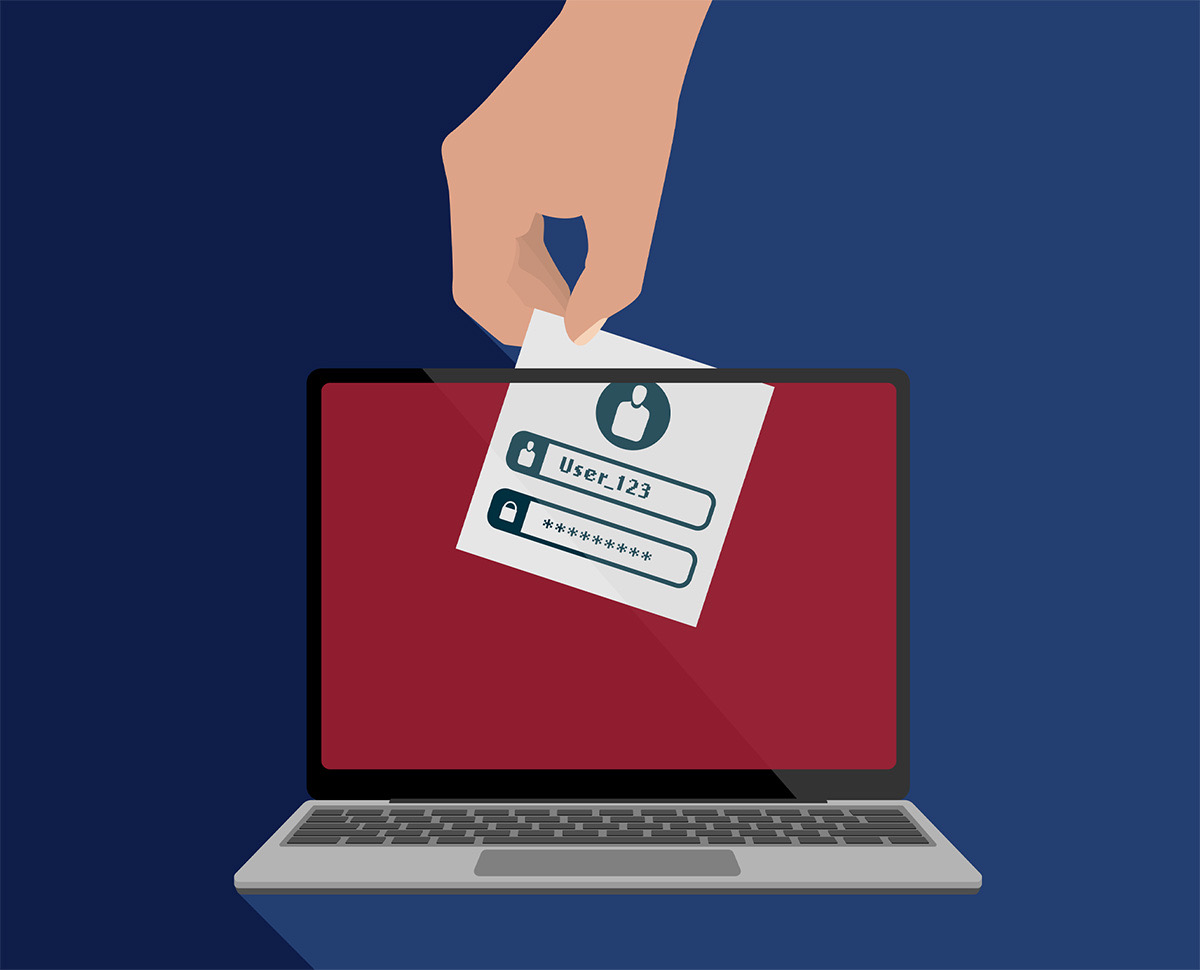 A login and password form extending from a laptop screen