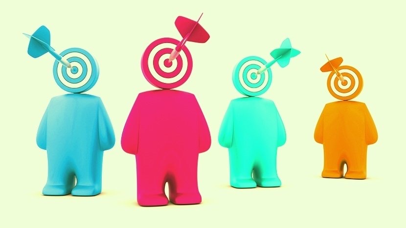 Four coloured figures with targets for heads